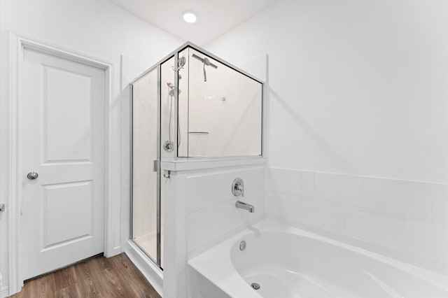 21123 Coral Blossom Ln, Cypress, TX 77433 - full bathroom with a garden tub, a shower stall, and wood finished floors