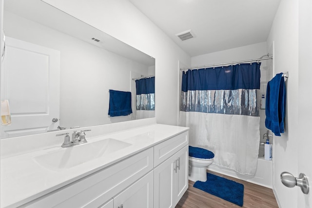 21123 Coral Blossom Ln, Cypress, TX 77433 - full bath with vanity, wood finished floors, toilet, and shower / bath combo