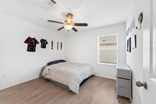 21123 Coral Blossom Ln, Cypress, TX 77433 - bedroom with light wood finished floors, baseboards, and a ceiling fan