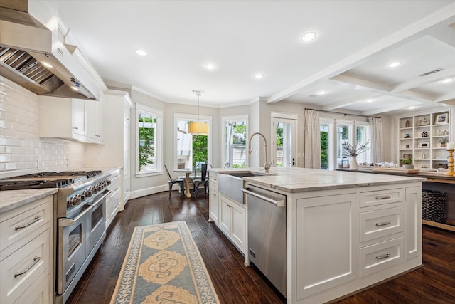 6021 Fordham St, West University Place, TX 77005 - kitchen with wall chimney range hood, appliances with stainless steel finishes, a sink, crown molding, and dark wood-type flooring