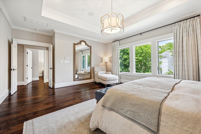 6021 Fordham St, West University Place, TX 77005 - bedroom with a tray ceiling, wood finished floors, crown molding, baseboards, and a chandelier