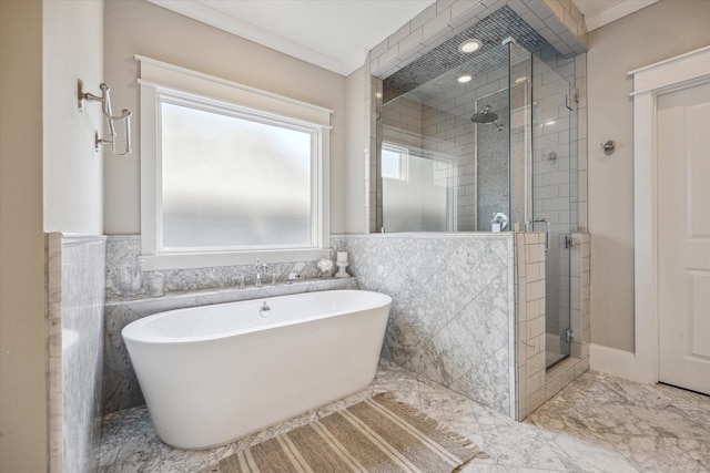 6021 Fordham St, West University Place, TX 77005 - bathroom with a soaking tub, a shower stall, tile walls, marble finish flooring, and a wainscoted wall