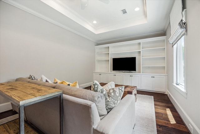6021 Fordham St, West University Place, TX 77005 - living area featuring dark wood-style floors, baseboards, ornamental molding, recessed lighting, and a raised ceiling
