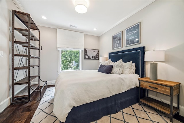 6021 Fordham St, West University Place, TX 77005 - bedroom with crown molding, baseboards, wood finished floors, and recessed lighting