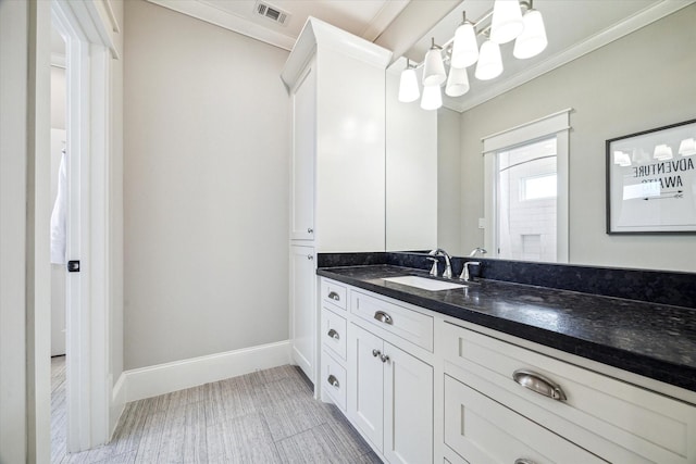 6021 Fordham St, West University Place, TX 77005 - bathroom with vanity, crown molding, and baseboards