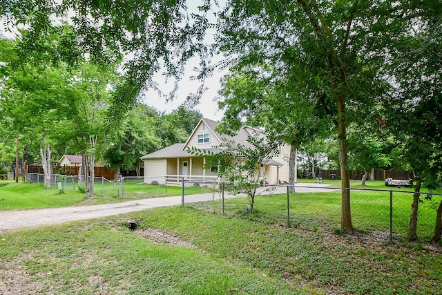 15115 Monrad Dr, Houston, TX 77053 - view of front of home featuring driveway and a gate
