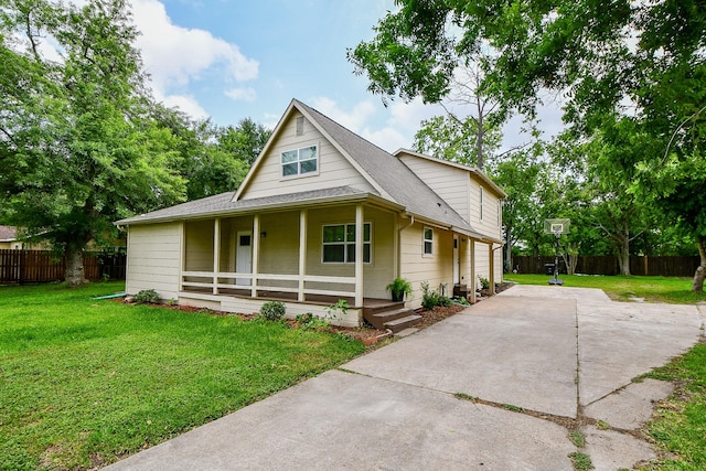 15115 Monrad Dr, Houston, TX 77053 - view of front of property with a porch, roof with shingles, and driveway