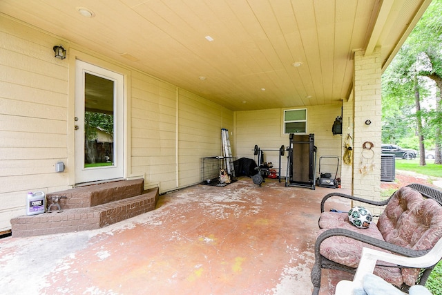 15115 Monrad Dr, Houston, TX 77053 - view of patio featuring entry steps and an attached carport