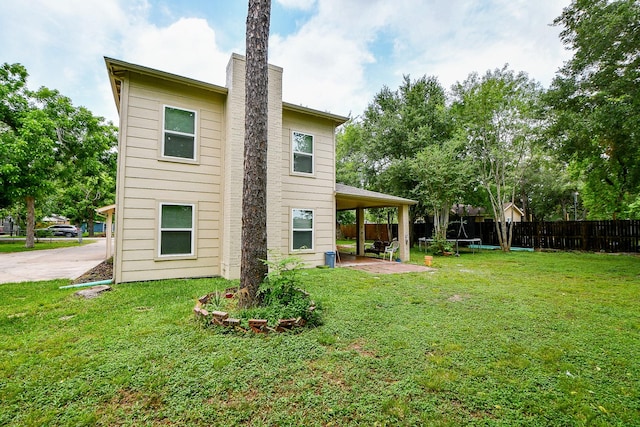15115 Monrad Dr, Houston, TX 77053 - rear view of property featuring a chimney and a patio