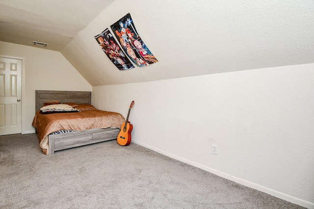 15115 Monrad Dr, Houston, TX 77053 - carpeted bedroom featuring lofted ceiling and baseboards