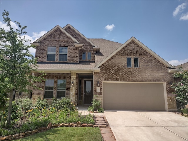 7814 Charter Hill Dr, Magnolia, TX 77354 - view of front facade featuring driveway, roof with shingles, a garage, brick siding, and stone siding