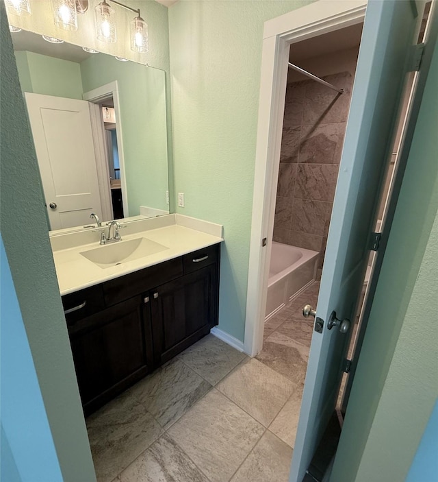 7814 Charter Hill Dr, Magnolia, TX 77354 - full bathroom with vanity, shower / washtub combination, baseboards, and a textured wall