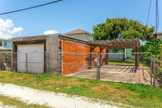 1523 22nd St, Galveston, TX 77550 - detached garage with a gate