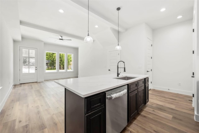 8618 Lee Otis St A-B, Unit A-B Houston, TX 77051 - kitchen featuring stainless steel dishwasher, a sink, open floor plan, baseboards, and light wood finished floors