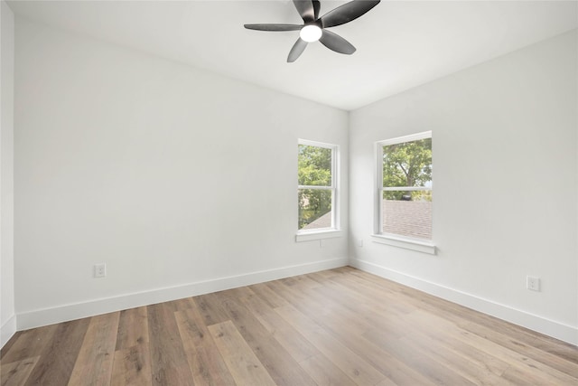 8618 Lee Otis St A-B, Unit A-B Houston, TX 77051 - empty room featuring baseboards, ceiling fan, and wood finished floors