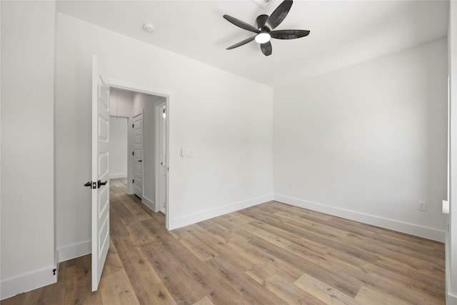 8618 Lee Otis St A-B, Unit A-B Houston, TX 77051 - unfurnished room with ceiling fan, a smoke detector, baseboards, and light wood finished floors
