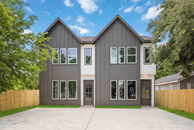 8618 Lee Otis St A-B, Unit A-B Houston, TX 77051 - view of front facade with board and batten siding and a patio