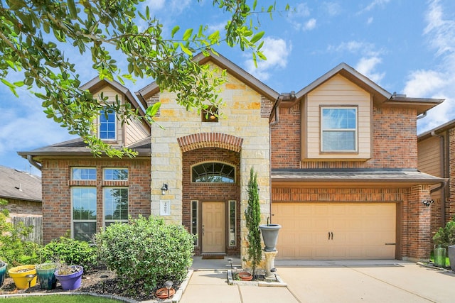 29007 Dryander Forest Ct, Katy, TX 77494 - view of front facade featuring driveway, a garage, and brick siding