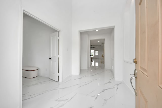 29007 Dryander Forest Ct, Katy, TX 77494 - hall featuring marble tiled flooring, baseboards, and recessed lighting