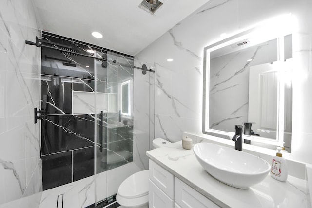 29007 Dryander Forest Ct, Katy, TX 77494 - full bathroom with vanity, a marble finish shower, toilet, recessed lighting, and tile walls