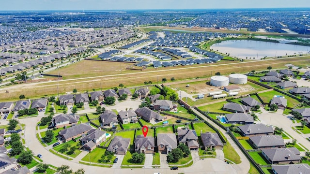 29007 Dryander Forest Ct, Katy, TX 77494 - aerial view of property and surrounding area featuring a large body of water and nearby suburban area