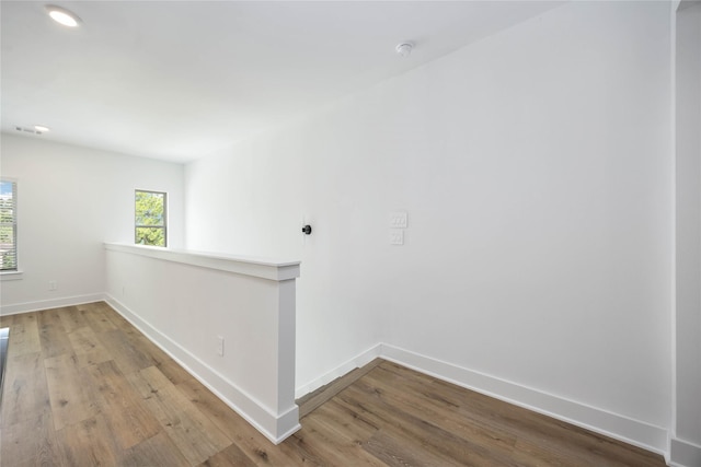 8019 Cora St, Houston, TX 77088 - unfurnished room with wood finished floors and baseboards