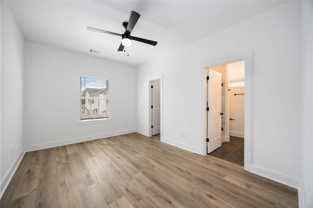 8019 Cora St, Houston, TX 77088 - unfurnished bedroom with wood finished floors and baseboards