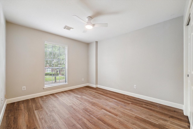 4643 Forest Home Dr, Missouri City, TX 77459 - spare room featuring ceiling fan, wood finished floors, and baseboards