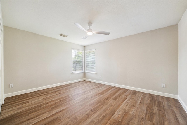 4643 Forest Home Dr, Missouri City, TX 77459 - empty room featuring ceiling fan, baseboards, and wood finished floors