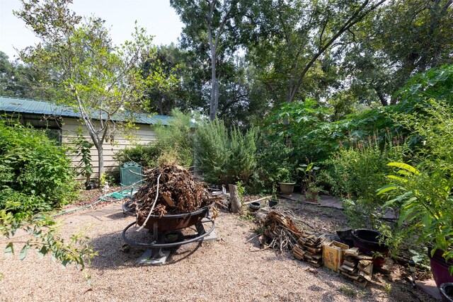 404 E Alabama St, Wharton, TX 77488 - view of yard with an outdoor fire pit