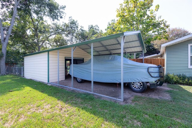 404 E Alabama St, Wharton, TX 77488 - view of car parking featuring a carport
