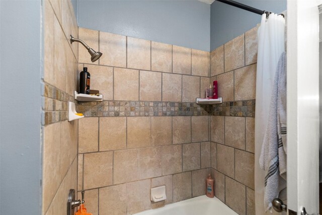 404 E Alabama St, Wharton, TX 77488 - bathroom featuring shower / tub combo