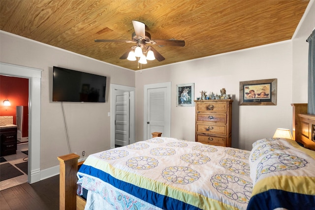 404 E Alabama St, Wharton, TX 77488 - bedroom featuring wood ceiling, hardwood / wood-style flooring, ornamental molding, ceiling fan, and a closet