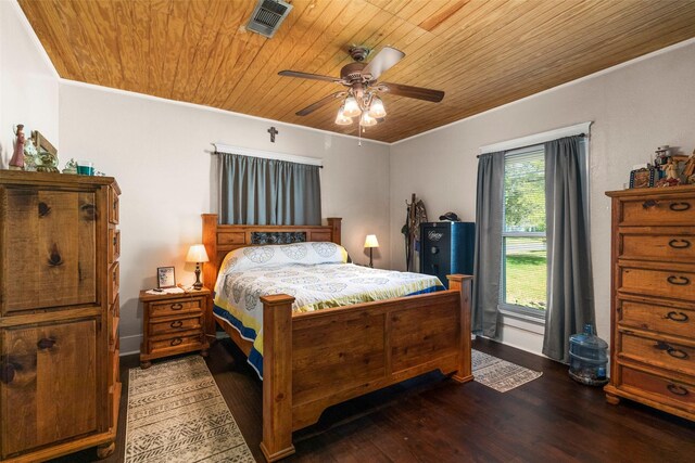 404 E Alabama St, Wharton, TX 77488 - bedroom with ornamental molding, wooden ceiling, wood finished floors, and ceiling fan