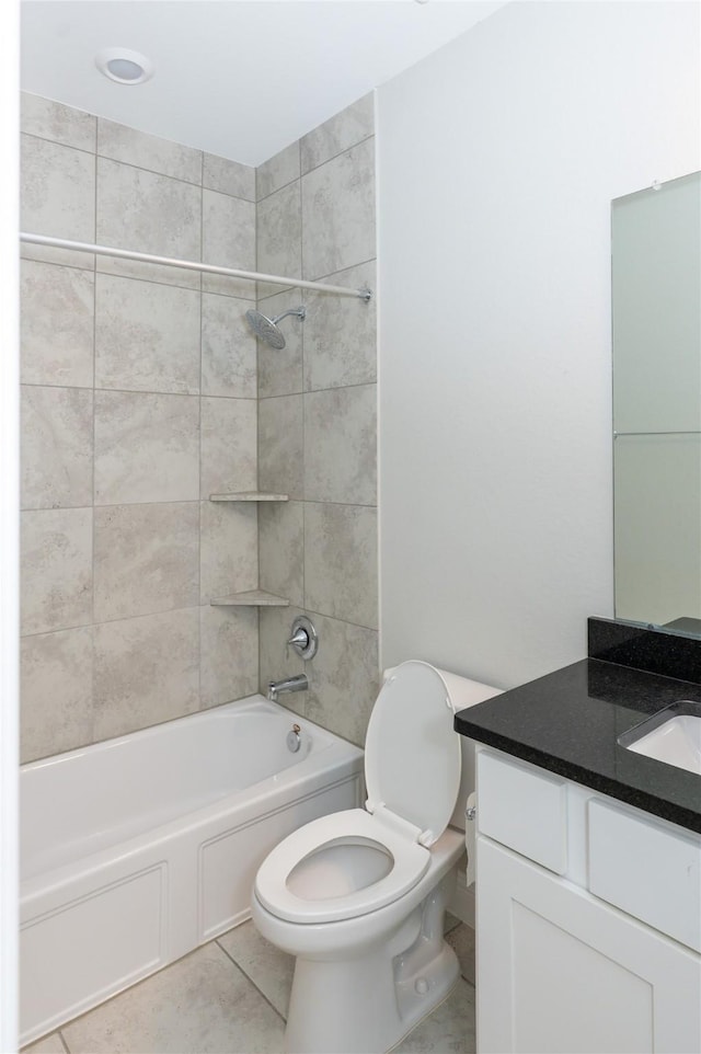 8408 Oak Leaf Point Dr, Houston, TX 77055 - full bathroom with toilet, vanity, tile patterned flooring, and tub / shower combination