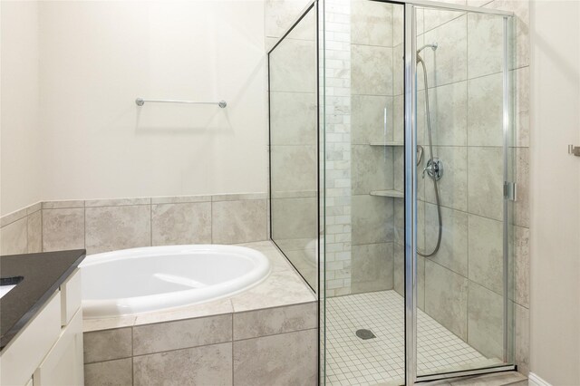 8408 Oak Leaf Point Dr, Houston, TX 77055 - full bathroom with a bath, a shower stall, and vanity