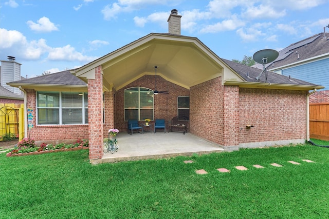 2230 Louetta Falls Ln, Spring, TX 77388 - back of property featuring brick siding, ceiling fan, a chimney, a patio, and roof with shingles