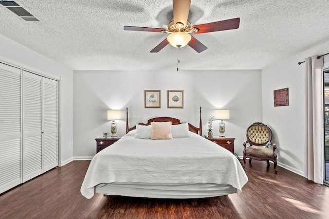 2505 Gerol Dr, Galveston, TX 77551 - bedroom with wood finished floors, a textured ceiling, baseboards, and a closet