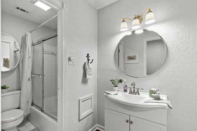 2505 Gerol Dr, Galveston, TX 77551 - bathroom featuring vanity, toilet, bath / shower combo with glass door, and a textured wall