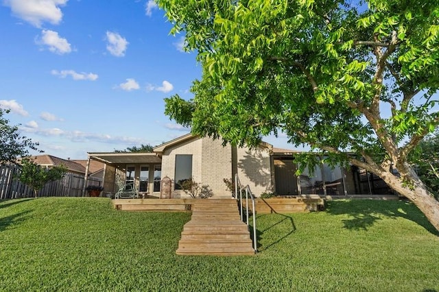 2505 Gerol Dr, Galveston, TX 77551 - rear view of house featuring brick siding