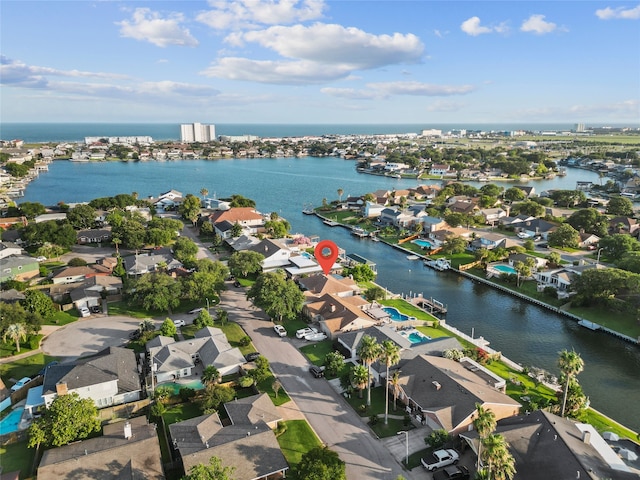 2505 Gerol Dr, Galveston, TX 77551 - aerial view of property and surrounding area featuring nearby suburban area and a large body of water