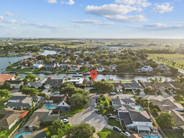 2505 Gerol Dr, Galveston, TX 77551 - aerial view of property's location with nearby suburban area and a large body of water