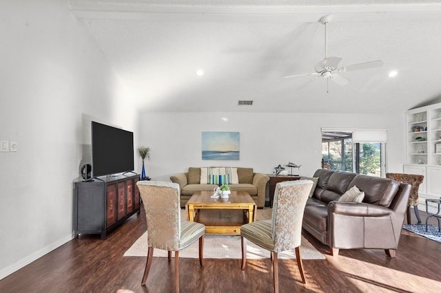 2505 Gerol Dr, Galveston, TX 77551 - living area with lofted ceiling, dark wood-style flooring, ceiling fan, and baseboards