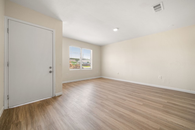 4726 Angleton St, Houston, TX 77033 - empty room with light wood-type flooring and baseboards
