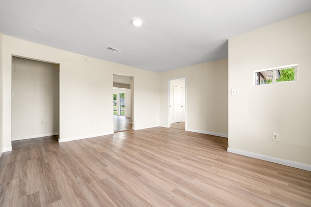 4726 Angleton St, Houston, TX 77033 - empty room with light wood-type flooring and baseboards