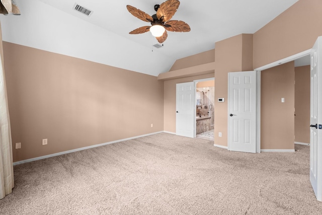 62 Treescape Cir, The Woodlands, TX 77381 - unfurnished bedroom featuring carpet, lofted ceiling, baseboards, and a ceiling fan