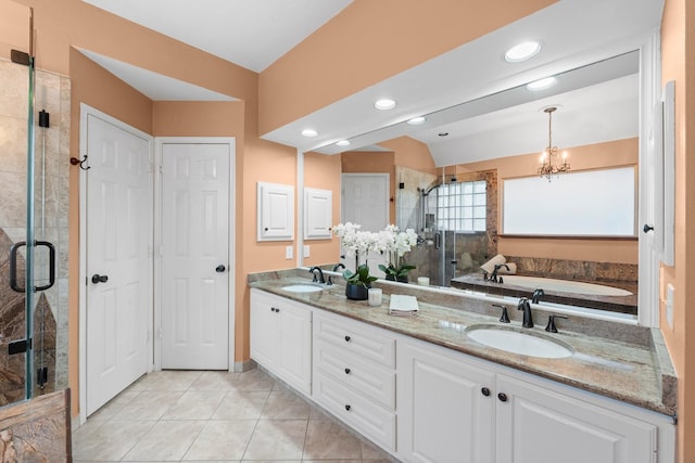62 Treescape Cir, The Woodlands, TX 77381 - bathroom featuring double vanity, a shower stall, tile patterned flooring, a garden tub, and a chandelier