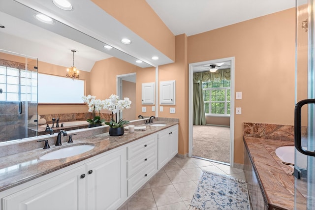 62 Treescape Cir, The Woodlands, TX 77381 - full bathroom with double vanity, tile patterned floors, a bath, baseboards, and recessed lighting