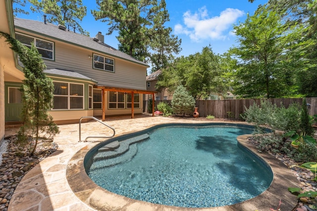 62 Treescape Cir, The Woodlands, TX 77381 - view of swimming pool with a patio area and a fenced backyard