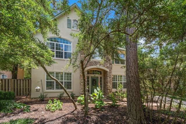 62 Treescape Cir, The Woodlands, TX 77381 - view of front of property featuring stucco siding and stone siding